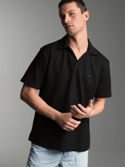 Oversized Poloshirt ohne Knopfleiste in Waffeloptik Schwarz