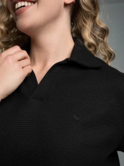 Oversized Poloshirt ohne Knopfleiste in Waffeloptik Schwarz