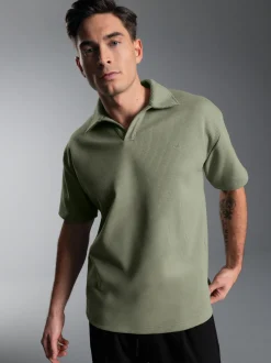 Oversized Poloshirt ohne Knopfleiste in Waffeloptik Salbei