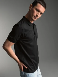 Poloshirt für Industriewäsche Schwinge am Arm Schwarz