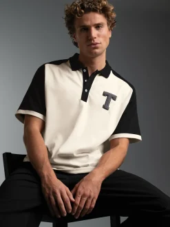 Poloshirt mit Raglanärmeln und trigema Brustpatch Natur